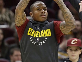 Cleveland Cavaliers' Isaiah Thomas warms up for the team's NBA basketball game against the Brooklyn Nets on Wednesday, Nov. 22, 2017, in Cleveland. (AP Photo/Tony Dejak)
