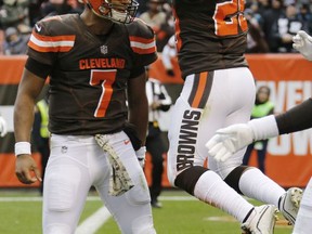 Cleveland Browns running back Duke Johnson, right, celebrates with quarterback DeShone Kizer, left, after scoring a touchdown after a 27-yard pass in the first half of an NFL football game against the Jacksonville Jaguars, Sunday, Nov. 19, 2017, in Cleveland. (AP Photo/Ron Schwane)