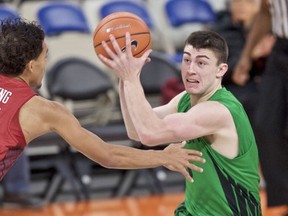 Oregon guard Payton Pritchard, right, drives to the basket past Oklahoma guard Trae Young during the first half of an NCAA college basketball game in the Phil Knight Invitational tournament in Portland, Ore., Sunday, Nov. 26, 2017. (AP Photo/Craig Mitchelldyer)