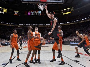 Gonzaga forward Killian Tillie dunks during the first half of an NCAA college basketball game against the Florida in the Phil Knight Invitational tournament in Portland, Ore., Friday, Nov. 24, 2017. (AP Photo/Craig Mitchelldyer)