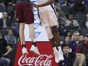 Villanova's Mikal Bridges, right, tries to defend the basket against Lafayette's Eric Stafford, left, during the first half of an NCAA college basketball game, Friday, Nov. 17, 2017, in Allentown, Pa. (AP Photo/Chris Szagola)