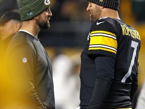 Pittsburgh Steelers quarterback Ben Roethlisberger (7) talks with Green Bay Packers quarterback Aaron Rodgers during warm ups before an NFL football game in Pittsburgh, Sunday, Nov. 26, 2017. (AP Photo/Keith Srakocic)