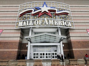 FILE - In this Oct. 27, 2010, file photo, an entrance to the Mall of America is seen in Bloomington, Minn. Police say two people were stabbed in the mall on Nov. 12, 2017, in what investigators say was an "interrupted theft."(AP Photo/Jim Mone, File)