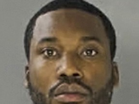 This November 2017 photo provided by the Pennsylvania Department of Corrections shows rapper Meek Mill, whose real name is Robert Williams, sentenced to serve two to four years in prison for violating probation in a nearly decade-old gun and drug case. A lawyer for Meek Mill asked Philadelphia Common Pleas Judge Genece Brinkley to recuse herself from the case Tuesday, Nov. 14, 2017, before the rapper appeals his prison sentence. (Pennsylvania Department of Corrections via AP)