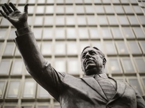 FILE – This Aug. 15, 2017, file photo shows a statue of late Philadelphia Mayor Frank Rizzo, who also served as the city's police commissioner, on Thomas Paine Plaza outside the Municipal Services Building in Philadelphia. Philadelphia will move the statue from its location in the shadow of City Hall, the city announced in a statement Friday, Nov. 3, 2017. A new site for the statue has not been announced. (AP Photo/Matt Rourke, File)