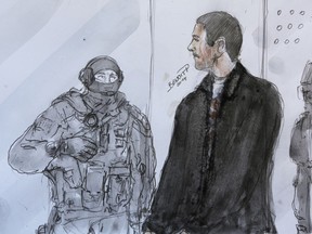 File - In this Thursday, June 12, 2014 file of an artist sketch, depicting Mehdi Nemmouche, right, as he stands next to a police officer during his court appearance at Versailles Court of Appeal, near Paris, France. The lawyer of a Frenchman accused of a deadly 2014 shooting at a Belgian Jewish Museum says his client has been handed preliminary terrorism charges in Paris relating to a separate case in Syria. (AP Photo/Benoit P., File)