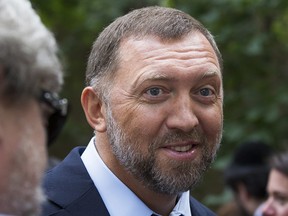 In this file photo taken on Thursday, July 2, 2015, Russian metals magnate Oleg Deripaska attends Independence Day celebrations at Spaso House, the residence of the American Ambassador, in Moscow, Russia.