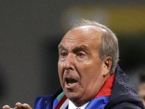 Italy coach Gian Piero Ventura gestures during the World Cup qualifying play-off second leg soccer match between Italy and Sweden, at the Milan San Siro stadium, Italy, Monday, Nov. 13, 2017. (AP Photo/Luca Bruno)