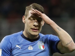 Italy's Andrea Belotti reacts after a missed chance during the World Cup qualifying play-off second leg soccer match between Italy and Sweden, at the Milan San Siro stadium, Italy, Monday, Nov. 13, 2017. (AP Photo/Luca Bruno)