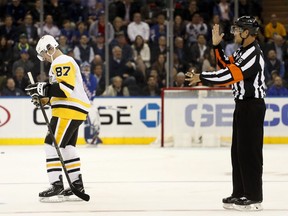 Pittsburgh Penguins centre Sidney Crosby heads to the penalty box after being called for slashing against the New York Rangers on Oct. 17.