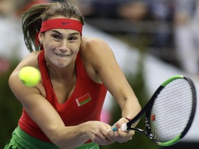 Aryna Sabalenka of Belarus returns a ball to CoCo Vandeweghe of the United States during the Fed Cup final match between Belarus and USA, in Minsk, Belarus, Sunday, Nov.12, 2017. (AP Photo/Sergei Grits)