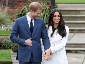 Prince Harry and actress Meghan Markle announce their engagement at The Sunken Gardens at Kensington Palace on Nov. 27, 2017 in London, England.