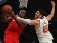 Toronto Raptors forward Serge Ibaka and Knicks centre Enes Kanter battle for a rebound during the fourth quarter of their game Wednesday night in New York. The Knicks won 108-100.