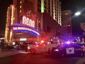 Police respond to an active shooter at a high-rise building of luxury condominiums in Reno, Nev., Tuesday, Nov. 28, 2017.