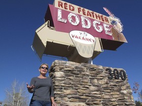 In this Tuesday, oct. 31, 2017 photo, Clarinda Vail stands outside the lodge her family owns in Tusayan, Ariz.. Vail opposes a ballot measure to increase building heights in the small town outside the Grand Canyon's South Rim entrance. (AP Photo/Felicia Fonseca)