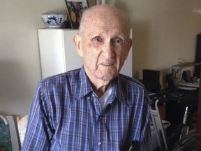 In this Tuesday, Nov. 21, 2017, photo, World War II veteran Kenneth F. Lincoln, 90, displays at his North Attleborough, Mass., home some of the medals he earned while serving in the U.S. Navy. Lincoln is finally getting the military decoration he earned for fighting a large fire that broke out among straw huts in Rabat, Morocco in the summer of 1946. He will receive a Moroccan award for meritorious conduct on Sunday, Nov. 26 in North Attleborough. (AP Photo/ Jennifer McDermott)