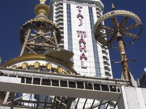 This Nov. 3, 2017 photo shows partially dismantled domes and spires at the former Trump Taj Mahal casino in Atlantic City, N.J. The casino that was built by now-President Donald Trump in 1990 is being converted into a Hard Rock casino resort. (AP Photo/Wayne Parry)