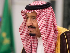 In this photo provided by the Saudi Press Agency, King Salman attends a swearing in ceremony in Riyadh, Saudi Arabia, Monday, Nov. 6, 2017. The king has sworn in new officials to take over from a powerful prince and former minister believed to be detained in a large-scale sweep that has shocked the country and upended longstanding traditions within the ruling family. (Saudi Press Agency, via AP)