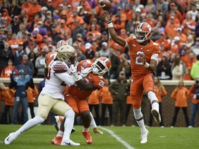 Clemson quarterback Kelly Bryant (2) throws a pass against Florida State during the first half of an NCAA college football game, Saturday, Nov. 11, 2017, in Clemson, S.C. (AP Photo/Rainier Ehrhardt)