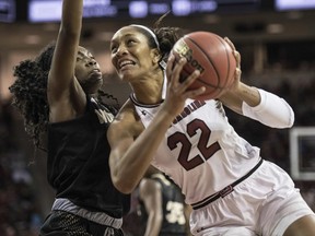 South Carolina forward A'ja Wilson (22) drives to the hoop against Wofford forward Jamari McDavid, left, during the first half of an NCAA college basketball game on Sunday, Nov. 19, 2017, in Columbia, S.C. (AP Photo/Sean Rayford)