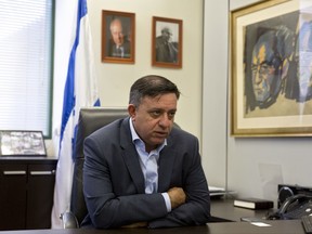 Israeli Labor Party leader Avi Gabbay, speaks during an interview with The Associated Press, at the Labor Party headquarters in Tel Aviv, Israel, Tuesday, Nov. 14, 2017. After falling out with Benjamin Netanyahu as a junior cabinet minister last year, Gabbay is now a leading candidate to replace the scandal-plagued prime minister. (AP Photo/Sebastian Scheiner)