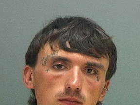 This undated photo provided by the Salt Lake County Jail shows Austin Boutain. Authorities are trying to figure out how a longtime criminal recently released from an Alabama prison ended up in a Utah canyon where he's suspected of killing a 23-year-old devout Mormon immigrant from China. (Salt Lake County Jail via AP)