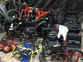 Nearly two dozen specialized sport wheelchairs, valued at around $4,000 each, were recovered by Saskatoon police on Nov. 24, 2017, months after the trailer in which they were stored was stolen. A 37-year-old man was charged with two counts of possession of stolen property over $5,000, while a second 37-year-old man was charged with one count of possession of stolen property over $5,000. (Photo courtesy Saskatoon Police Service)