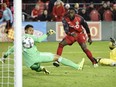 Jozy Altidore of the Toronto FC Reds scores the lone goal of the match against Columbus Crew keeper Zack Steffen during MLS East Conference Final action Wednesday at BMO Field. The goal gave the Reds the aggregate series 1-0 and propelled them into the MLS championship final for the second year in a row.