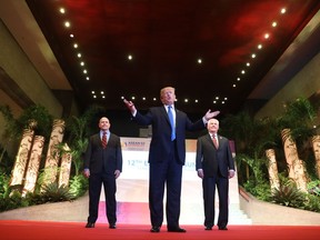 President Donald Trump, center,  gives a statement before leaving for the airport, an East Asia Summit at the Philippine International Convention Center, Tuesday, Nov. 14, 2017, in Manila, Philippines. Secretary of State Rex Tillerson is seen at right while National Security Adviser H.R. McMaster is at left. Trump is on a five country trip through Asia traveling to Japan, South Korea, China, Vietnam and the Philippines. (AP Photo/Andrew Harnik)