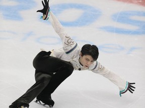 FILE - In this Oct. 21, 2017, file photo, Japan's Hanyu Yuzuru performs in his free program at the Rostelekom Cup ISU Grand Prix figure skating event in Moscow, Russia. Olympic champion Hanyu will be aiming for the top of the podium at the NHK Trophy, the fourth event of the International Skating Union's Grand Prix series, on Nov. 10, 11, 2017. (AP Photo/Ivan Sekretarev, File)