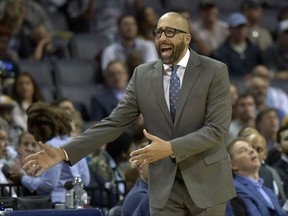 Memphis Grizzlies head coach David Fizdale reacts in the first half of an NBA basketball game against the Indiana Pacers Wednesday, Nov. 15, 2017, in Memphis, Tenn. (AP Photo/Brandon Dill)