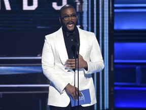 Tyler Perry presents the award for album of the year at the 51st annual CMA Awards at the Bridgestone Arena on Wednesday, Nov. 8, 2017, in Nashville, Tenn. (Photo by Chris Pizzello/Invision/AP)