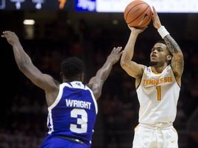 Tennessee guard Lamonte Turner (1) attempts a shot past High Point guard Jamal White (3) during an NCAA college basketball game Tuesday, Nov. 14, 2017, in Knoxville, Tenn. (Knoxville News Sentinel via AP)