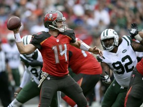 Tampa Bay Buccaneers quarterback Ryan Fitzpatrick (14) throws a pass against the New York Jets during the first half of an NFL football game Sunday, Nov. 12, 2017, in Tampa, Fla. (AP Photo/Jason Behnken)