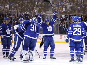 Toronto Maple Leafs players celebrate a win over the New Jersey Devils on Nov. 16.
