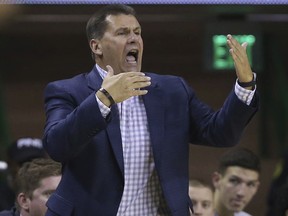 Central Arkansas head coach Russ Pennell reacts to a play against Baylor in the first half of a NCAA college basketball game, Friday, Nov. 10, 2017, in Waco, Texas. (AP Photo/Jerry Larson)