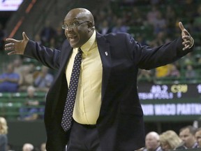 Coppin State Head Coach Dewayne Burroughs reacts to a play against the Baylor Lady Bears in the first half of a NCAA college basketball game, Sunday. Nov. 12, 2017, in Waco, Tx. (AP Photo/Jerry Larson)