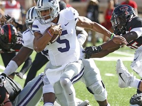 Kansas State's Alex Delton (5) runs with the ball during an NCAA college football game against Texas Tech, Saturday, Nov. 4, 2017, in Lubbock, Texas. (Brad Tollefson/Lubbock Avalanche-Journal via AP)