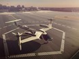 This computer generated image provided by Uber Technologies on Wednesday, Nov. 8, 2017 shows a flying taxi by Uber. Commuters of the future could get some relief from congested roads if Uber's plans for flying taxis work out. The ride-hailing service has unveiled an artist's impression of the sleek, futuristic machine it hopes to start using for demonstration flights in 2020 and deploy for ride-sharing by 2028.