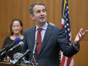 Virginia Gov.-elect, Ralph Northam gestures during a news conference at the Capitol in Richmond, Va., Wednesday, Nov. 8, 2017. Northam defeated Republican Ed Gillespie in Tuesday's election. (AP Photo/Steve Helber)