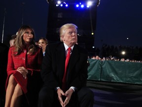 President Donald Trump and first lady Melania Trump watch performances during the National Christmas Tree lighting ceremony at the Ellipse near the White House in Washington, Thursday, Nov. 30, 2017. (AP Photo/Manuel Balce Ceneta)