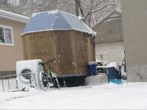A shack built by a squatter in the driveway of Cardston, Alta. home is shown in a handout photo. A southern Alberta landlord is hoping the courts will help him with a squatter living in a small shack sitting on a trailer in the driveway of the man's rental property. THE CANADIAN PRESS/HO-Ivan Negrych MANDATORY CREDIT