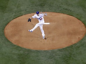 Los Angeles Dodgers starting pitcher Rich Hill throws against the Houston Astros during the first inning of Game 6 of baseball's World Series Tuesday, Oct. 31, 2017, in Los Angeles. (AP Photo/Mark J. Terrill)