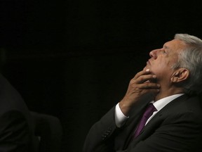 In this Monday, Nov. 20, 2017 photo, presidential hopeful Andres Manuel Lopez Obrador arrives at the National Auditorium in Mexico City. Lopez Obrador, making his third bid for Mexico's presidency, laid out his platform for next year's presidential elections. (AP Photo/Marco Ugarte)