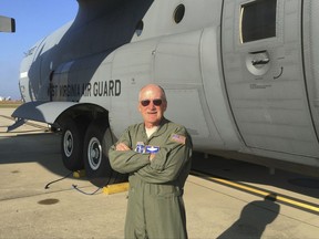 In this Sept. 27, 2017 photo, Chief Master Sgt. Dave Boyles stands on the tarmac in Charleston, W.Va., by one of the Air National Guard's C-130 cargo planes on which he's worked as a load master for three decades flying around the U.S. and the world including the war zones of Iraq and Afghanistan. Under the Trump administration, those missions for the 130th Airlift Wing are continuing this year, with six of its eight planes deployed to southwestern Asia. (AP Photo/Michael Virtanen)