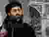 This image made from video posted on a militant website July 5, 2014, purports to show the leader of the Islamic State group, Abu Bakr al-Baghdadi, delivering a sermon at a mosque in Iraq during his first public appearance.