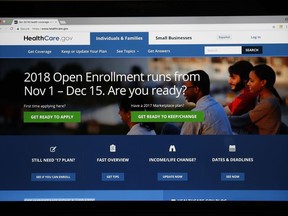 The Healthcare.gov website is seen on a computer screen Wednesday, Oct. 18, 2017, in Washington. The government says more than 600,000 people signed up for Affordable Care Act coverage in the first week of open enrollment season, and nearly 8 in 10 of those were current customers renewing their coverage.  (AP Photo/Alex Brandon)