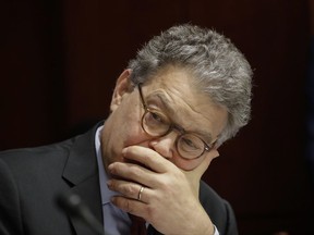 FILE - In this June 21, 2017 file photo, Sen. Al Franken, D-Minn., listens at a committee hearing at the Capitol in Washington. Franken apologized Thursday after a Los Angeles radio anchor accused him of forcibly kissing her during a 2006 USO tour and of posing for a photo with his hands on her breasts as she slept.  (AP Photo/J. Scott Applewhite)