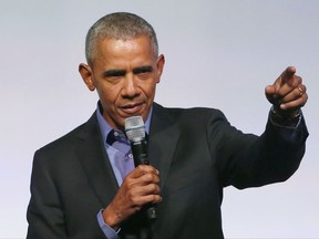 In this Nov. 1, 2017 photo, former President Barack Obama addresses the crowd as the last speaker at final session of the Obama Foundation Summit in Chicago. Obama is re-emerging on the global stage with a three-country tour that includes meetings with the leaders of China and India. Obama's office says he arrived in Shanghai on Tuesday to speak at a business summit.  (AP Photo/Charles Rex Arbogast)
