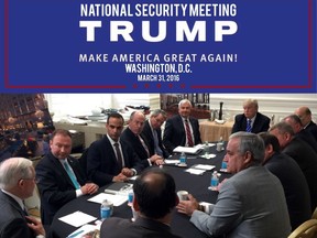 In this photo from President Donald Trump's Twitter account, George Papadopoulos, third from left, sits at a table with then-candidate Trump and others at what is labeled at a national security meeting in Washington that was posted on March 31, 2016. Papadopoulos, a former Trump campaign aide belittled by the White House as a low-level volunteer was thrust on Oct. 30, 2017, to the center of special counsel Robert Mueller's investigation, providing evidence in the first criminal case that connects Trump's team and intermediaries for Russia seeking to interfere in the campaign. (Donald Trump's Twitter account via AP)